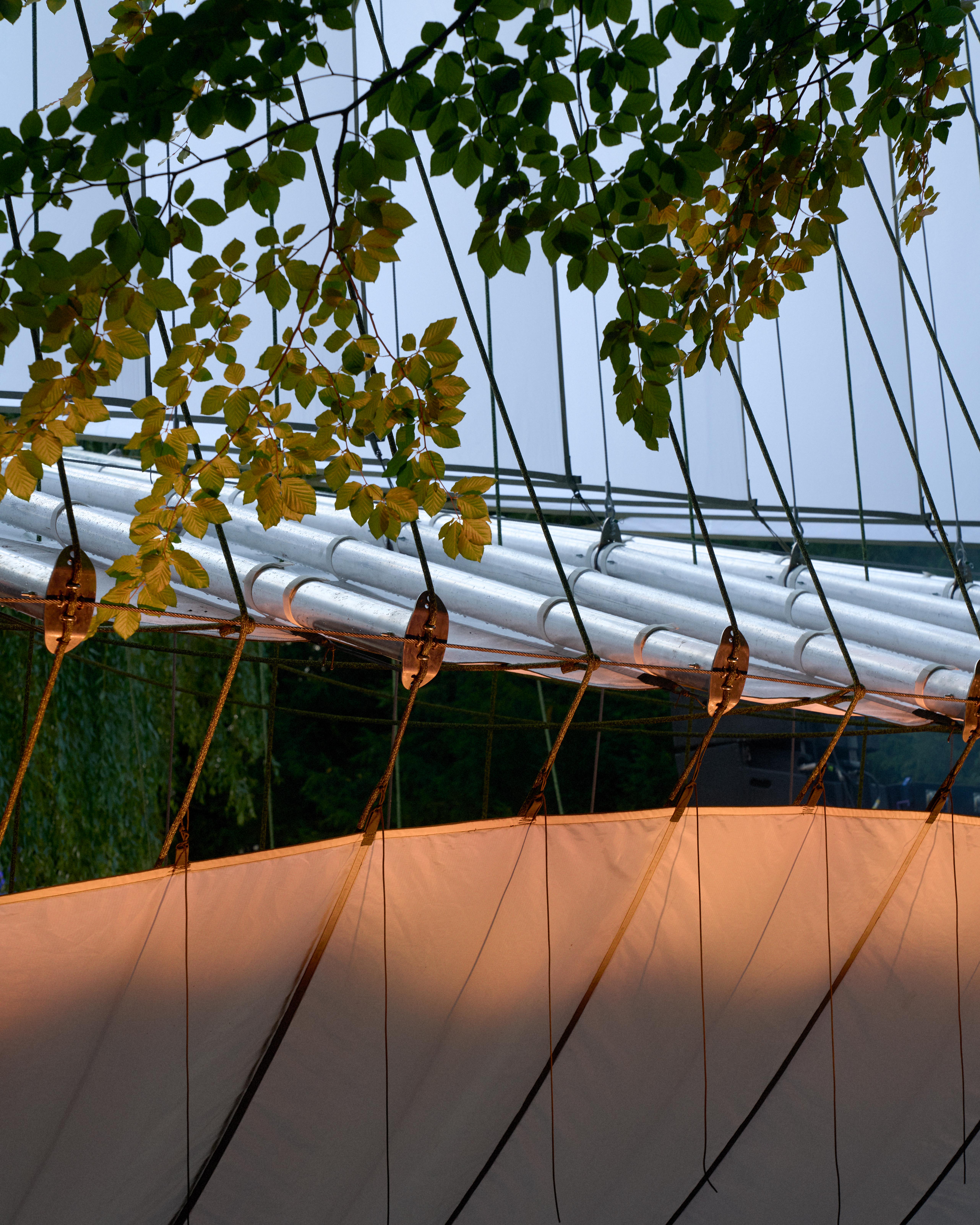 At Dekmantel Festival, a white tent over a stage in the woods