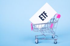 A sign reading "ETF" in a shopping cart.