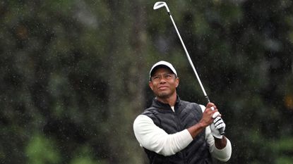 Tiger Woods hits an iron shot during The Masters