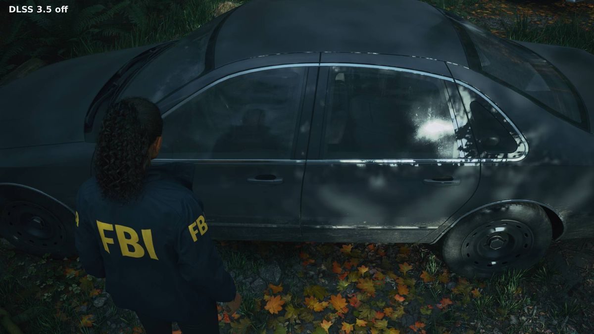 Alan Wake 2 screenshot with Ray Reconstruction off next to car