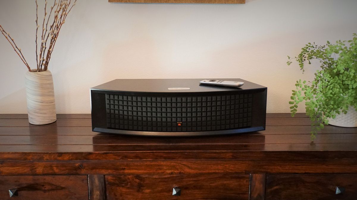 JBL L42MS player on a dark wood desk