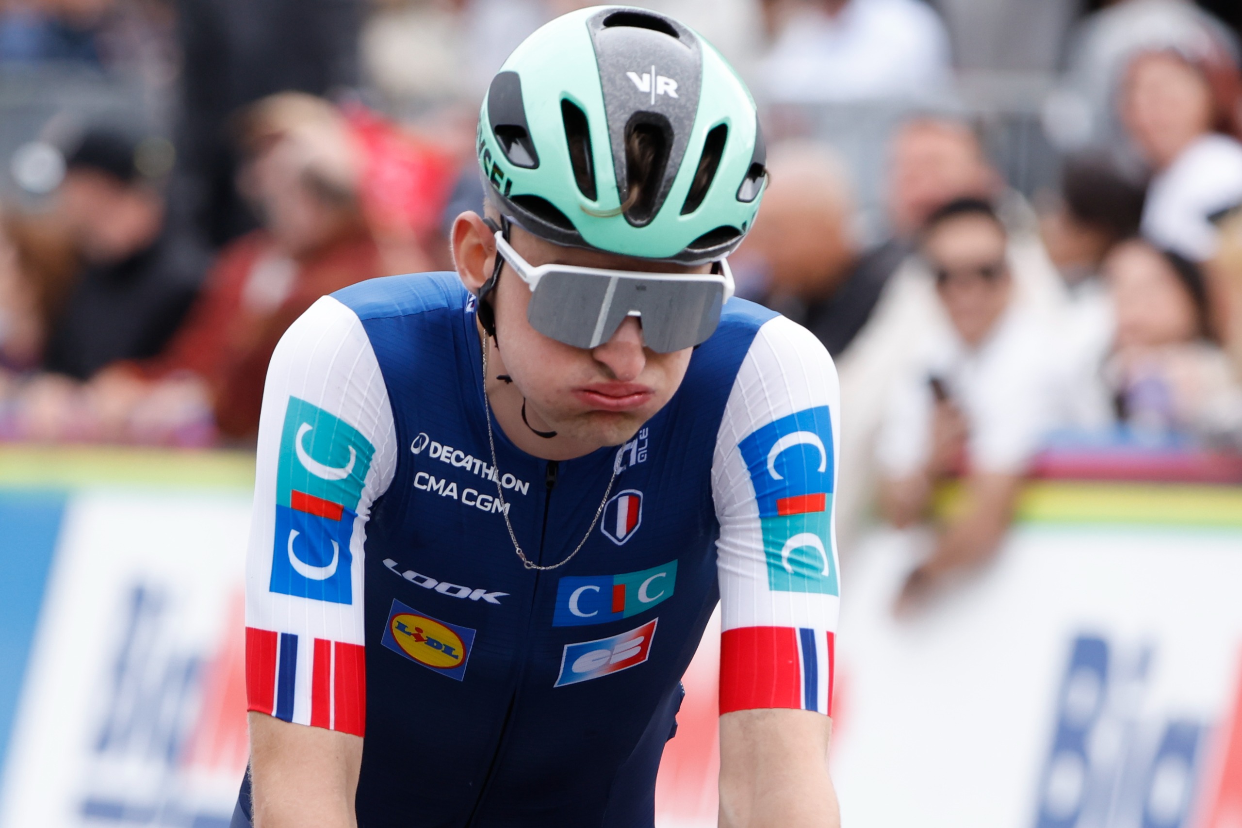 Paul Seixas blowing out his cheeks at the finish line of the UCI Road World Championships 2026