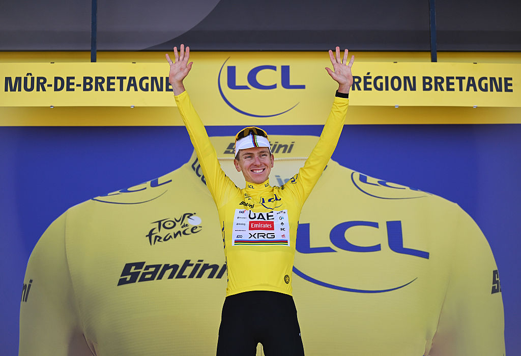 MUR-DE-BRETAGNE - GUERLEDAN, FRANCE - JULY 11: Tadej Pogacar of Slovenia and UAE Team Emirates - XRG celebrates at podium as Yellow Leader Jersey winner during the 112th Tour de France, Stage 7 a 197km stage from Saint-Malo to Mur-de-Bretagne (Guerledan) / #UCIWT / on July 11, 2025 in Saint-Malo, France. (Photo by Tim de Waele/Getty Images)