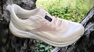 Reebok Floatride Energy 4 running shoe on a tree branch