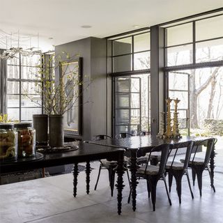 dining area with black dining table and black chairs