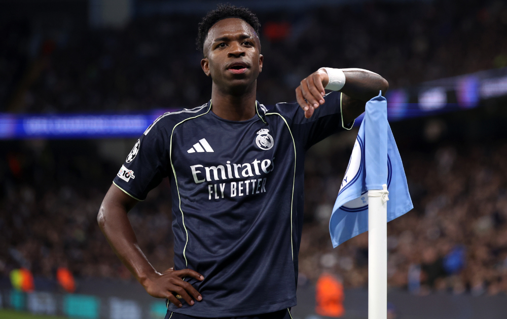 Vinicius Junior of Real Madrid celebrates scoring his team's first goal from the penalty spot during the UEFA Champions League 2025/26 Round of 16 Second Leg match between Manchester City FC and Real Madrid CF at City of Manchester Stadium on March 17, 2026 in Manchester, England. 