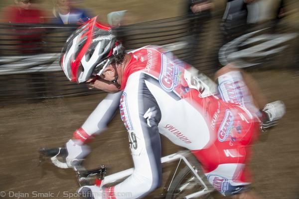 Justin Robinson (California Giant) remounting his bike before heading up a small climb