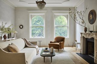 Beige living room with tan velvet accent chair