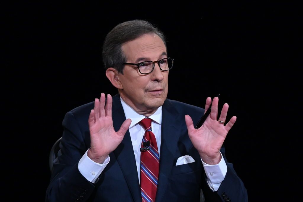 Debate moderator and Fox News anchor Chris Wallace directs the first presidential debate at Case Western Reserve University and Cleveland Clinic in Cleveland, Ohio, on September 29, 2020.