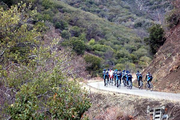 The team still climbing as rain approaches.