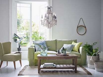 Green living room by Marks and Spencer
