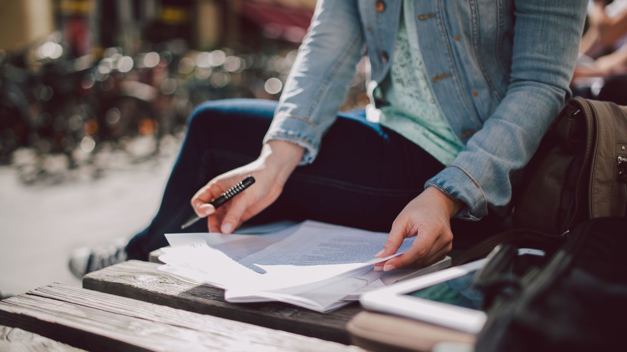 Jacket, Denim, Street fashion, Blazer, Pocket, Bag, Writing implement, Office supplies, Nail, Publication, 