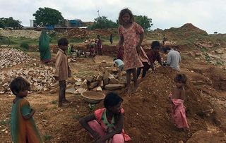 Children in a stone quarry in Allahabad where kids are still born into slavery