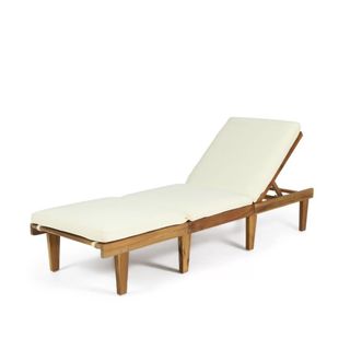 A wooden chaise lounge