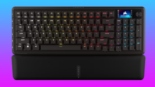 The Corsair Vanguard Pro 96 wired keyboard floats in a pink-blue gradient void.