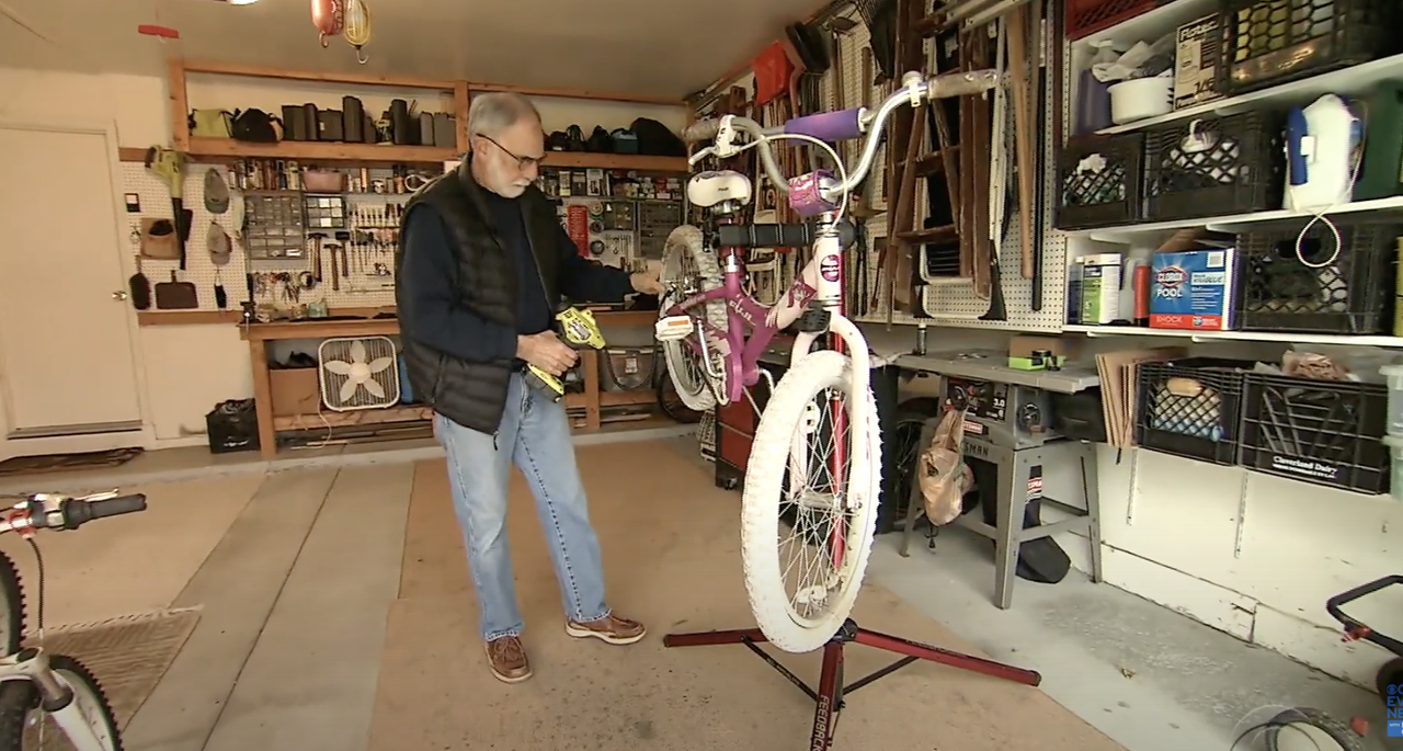 Ric Jackson fixes a bike.