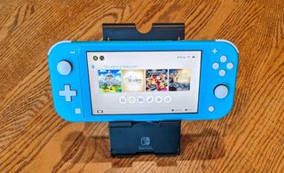 How to pair Joy-Cons Nintendo Switch Lite: Since the Switch Lite doesn't have a kickstand you will need to prop it up