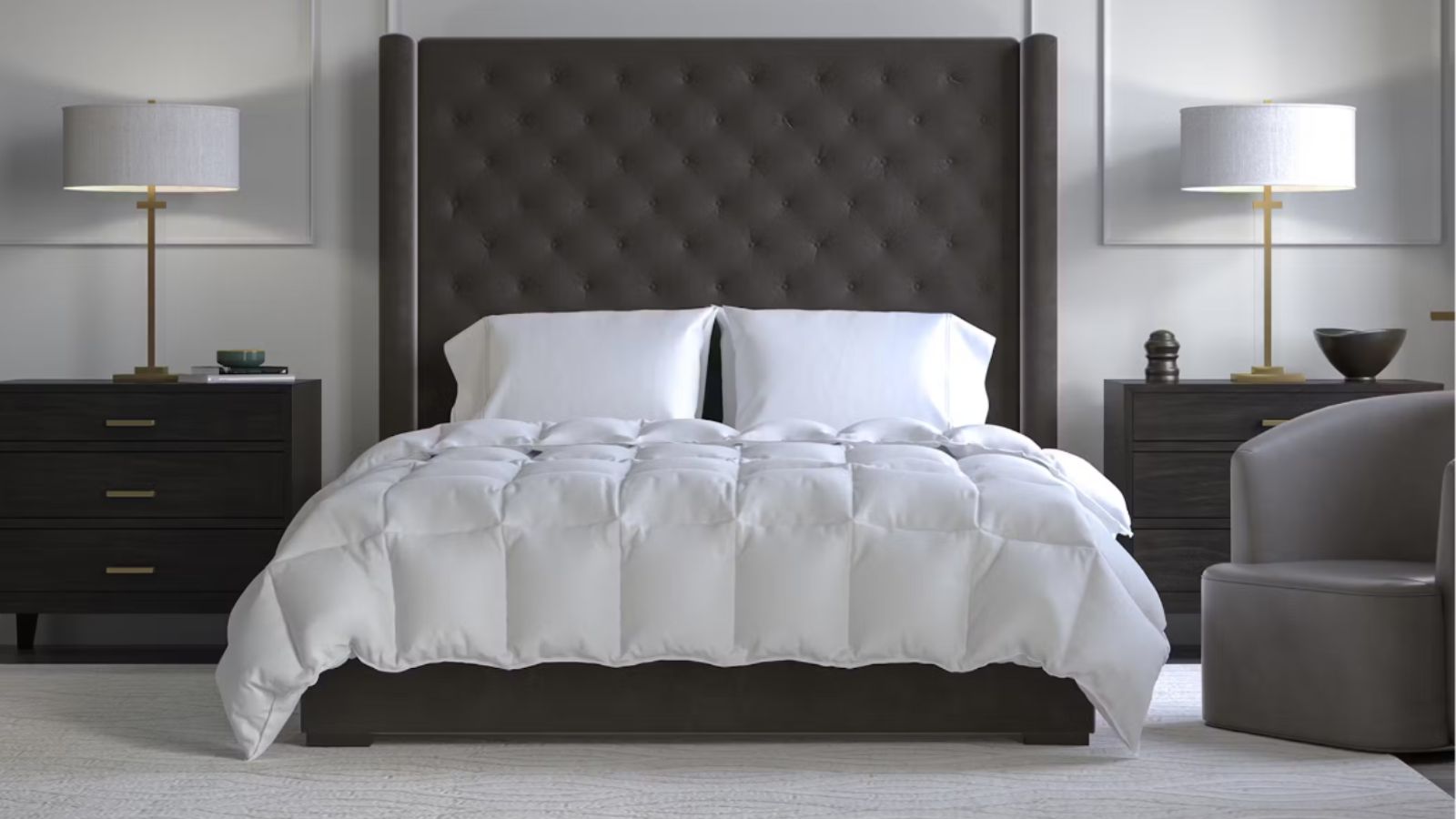 Saatva comforter on a bed in a modern hotel-style bedroom