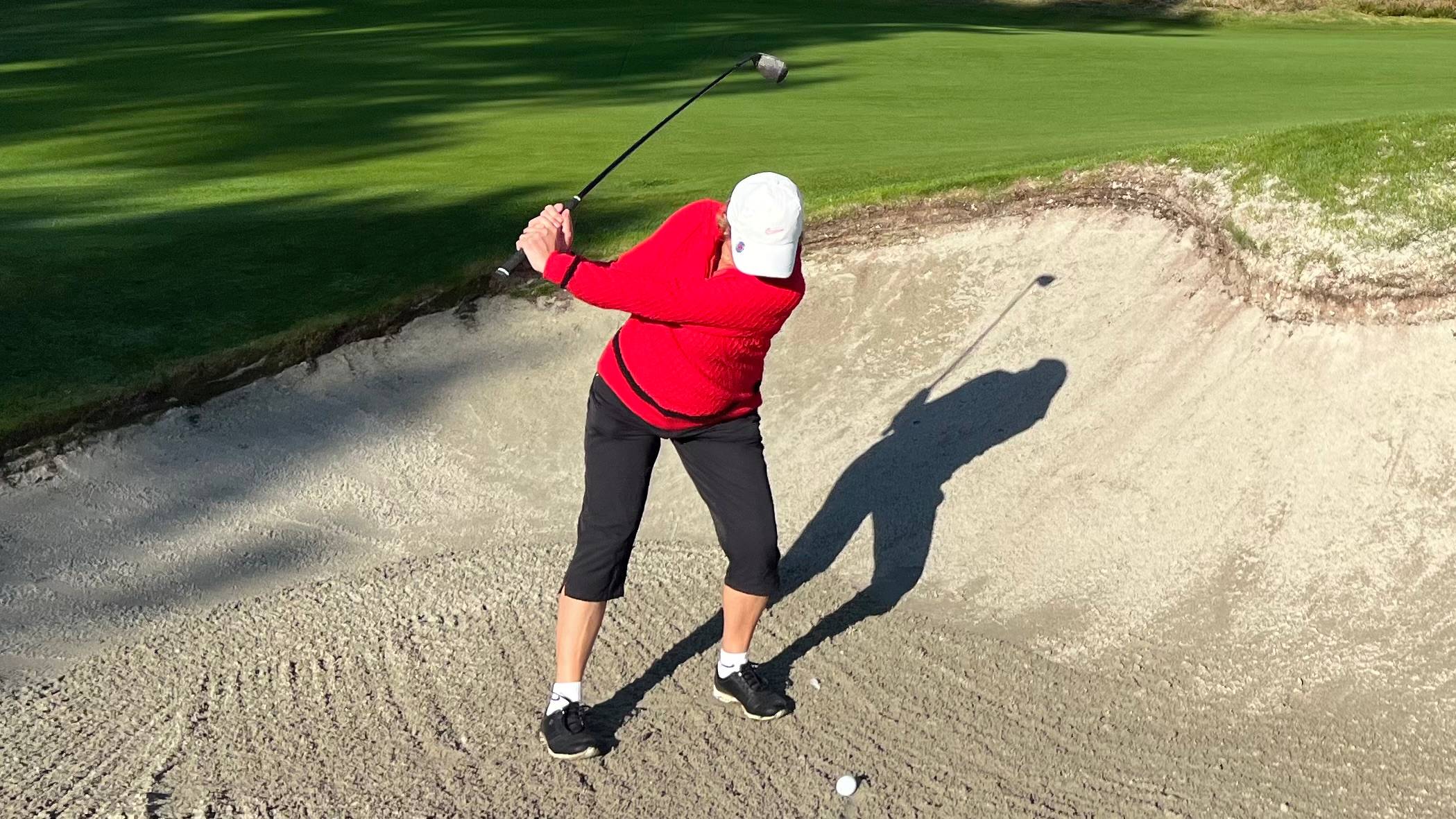Denise Pratt using the Eleven Golf Bunker Blaster