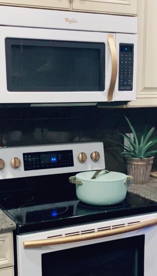 a painted stove and microwave