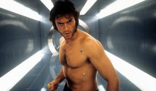 X-Men Hugh Jackman shirtless in the hallway leading to Cerebro