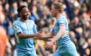 Manchester City’s Kevin De Bruyne (right) celebrates with Raheem Sterling after scoring their side’s first goal of the game during the Premier League match at Etihad Stadium, Manchester. Picture date: Saturday January 15, 2022
