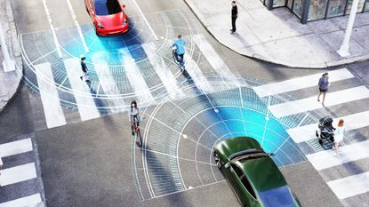 A graphic showing cars sensing the position of pedestrians at a busy urban road junction