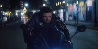 The Winter Soldier (Sebastian Stan) riding a motorcycle in The Falcon And The Winter Soldier