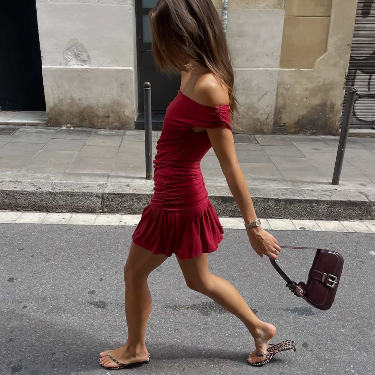 Woman in a red dress and sandals