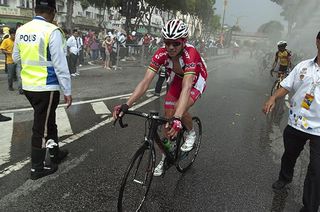 Darren Lapthorne (Drapac Cycling) makes his way to the team car after finishing second on the stage and riding into the overall lead.