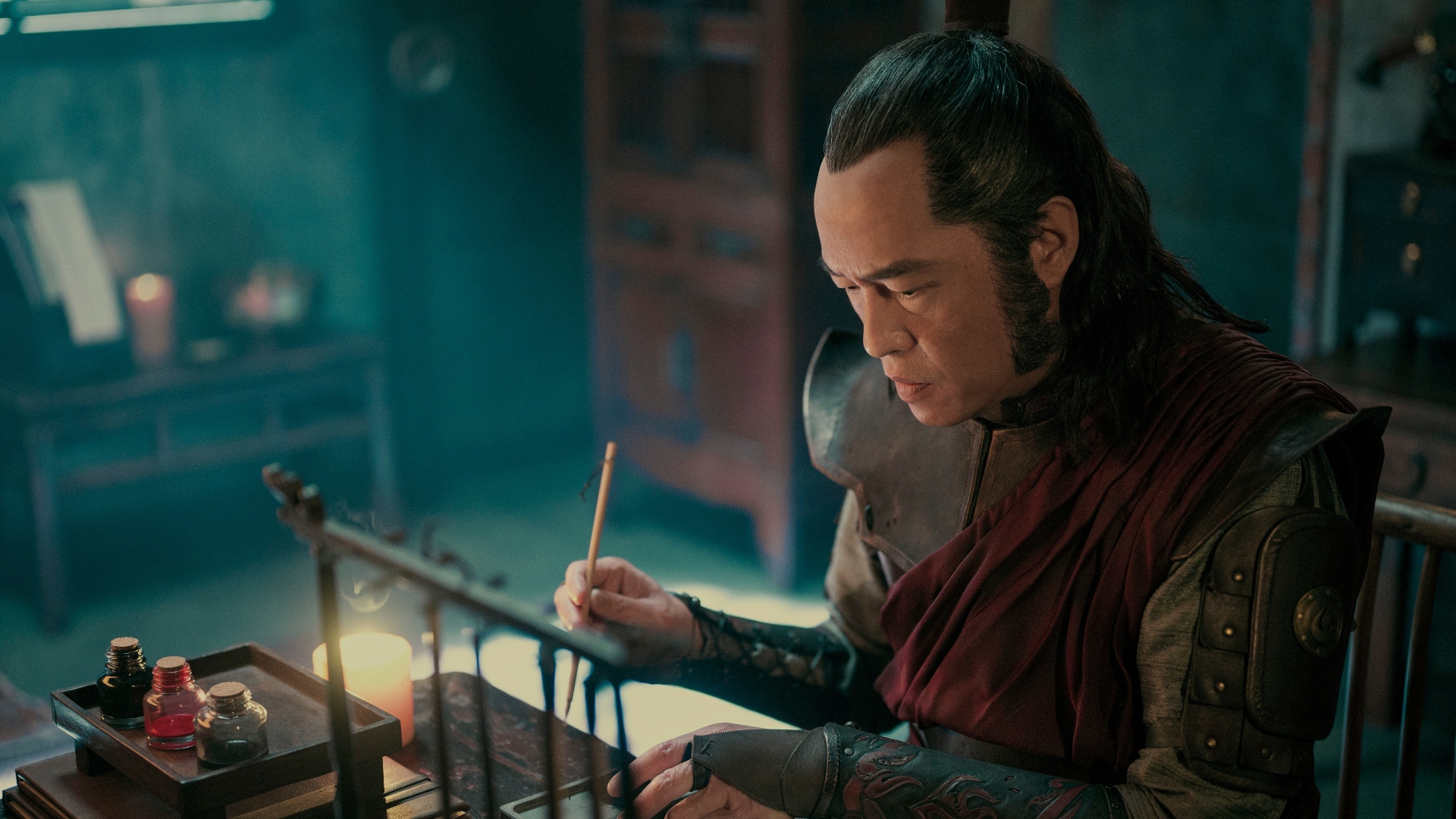 Avatar: The Last Airbender Commander Zhao writing at a desk
