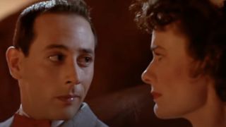 Paul Reubens as Pee-wee watching the sunrise with Diane Salinger as Simone in Pee-wee's Big Adventure