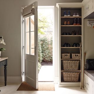 white door and shelves with basket