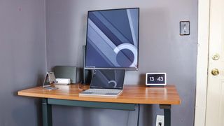 The Branch Duo standing desk with a desk setup built around the LG DualUp monitor