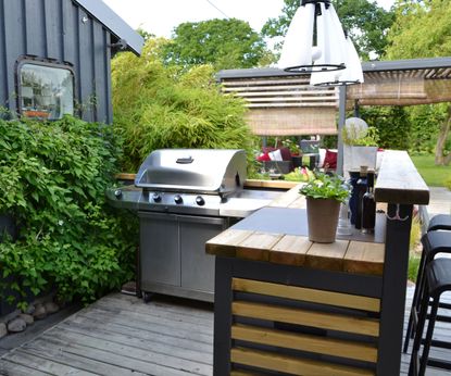 Why you don't need to overspend on grills - a cheap outdoor kitchen with grill