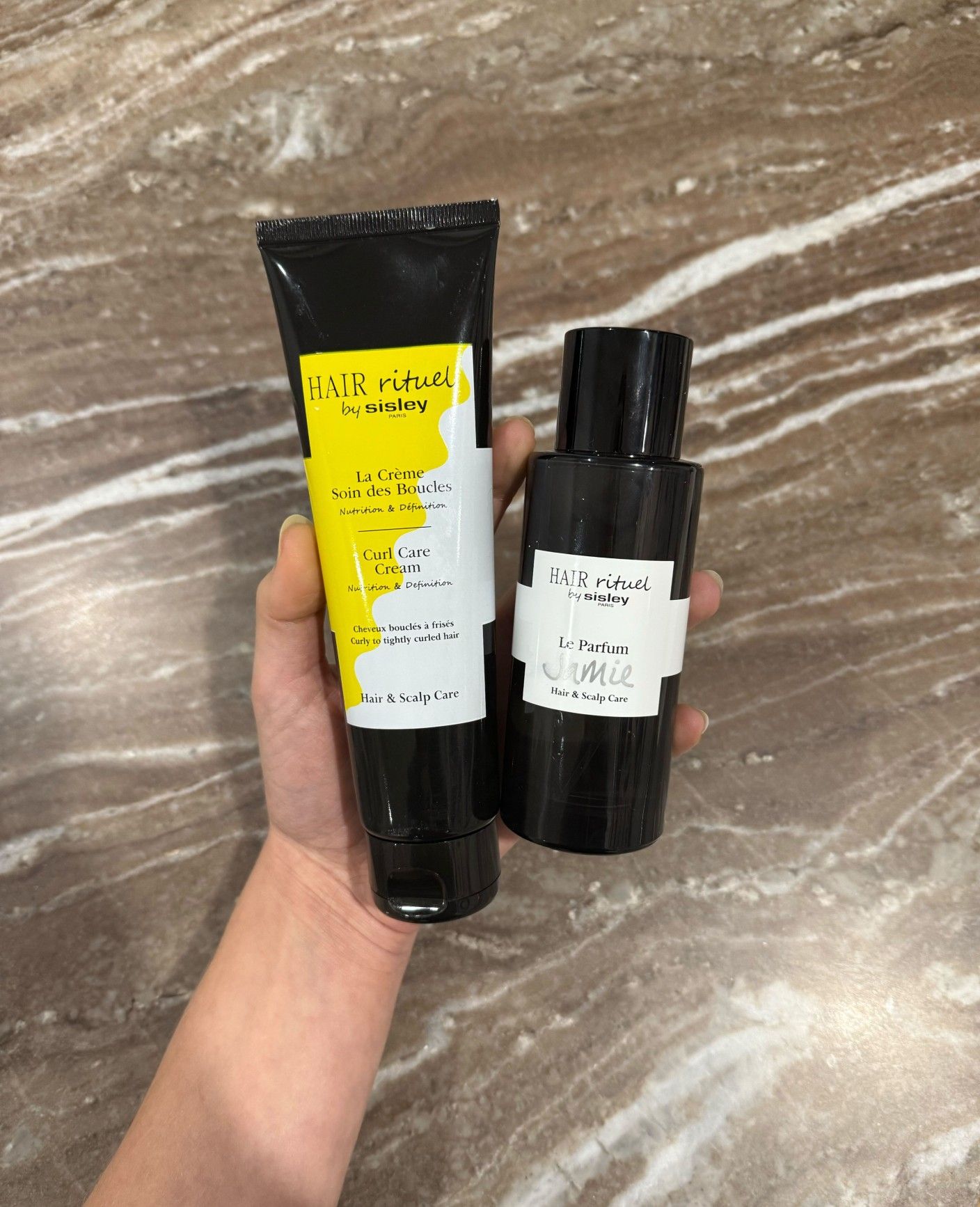 Jamie Schneider using Sisley Paris Hair Rituel products