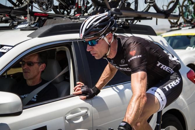 Jens Voigt (Trek) gets some info from the team car