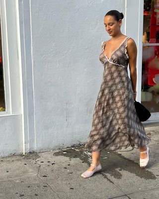 woman wearing satin ballet flats and slip dress