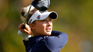 Nelly Korda takes a shot prior to the PNC Championship