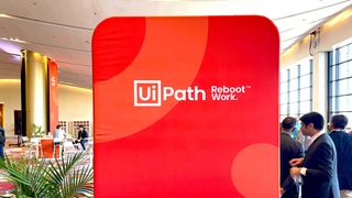 Photo of UiPath branded sign in the convention hall in which Forward 5 was held