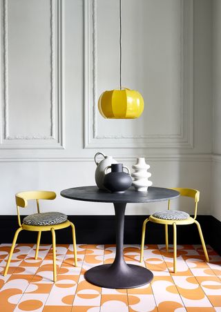 Round dining table painted in Annie Sloan Athenian black