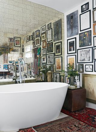 Bathroom with mirror wall of tiles