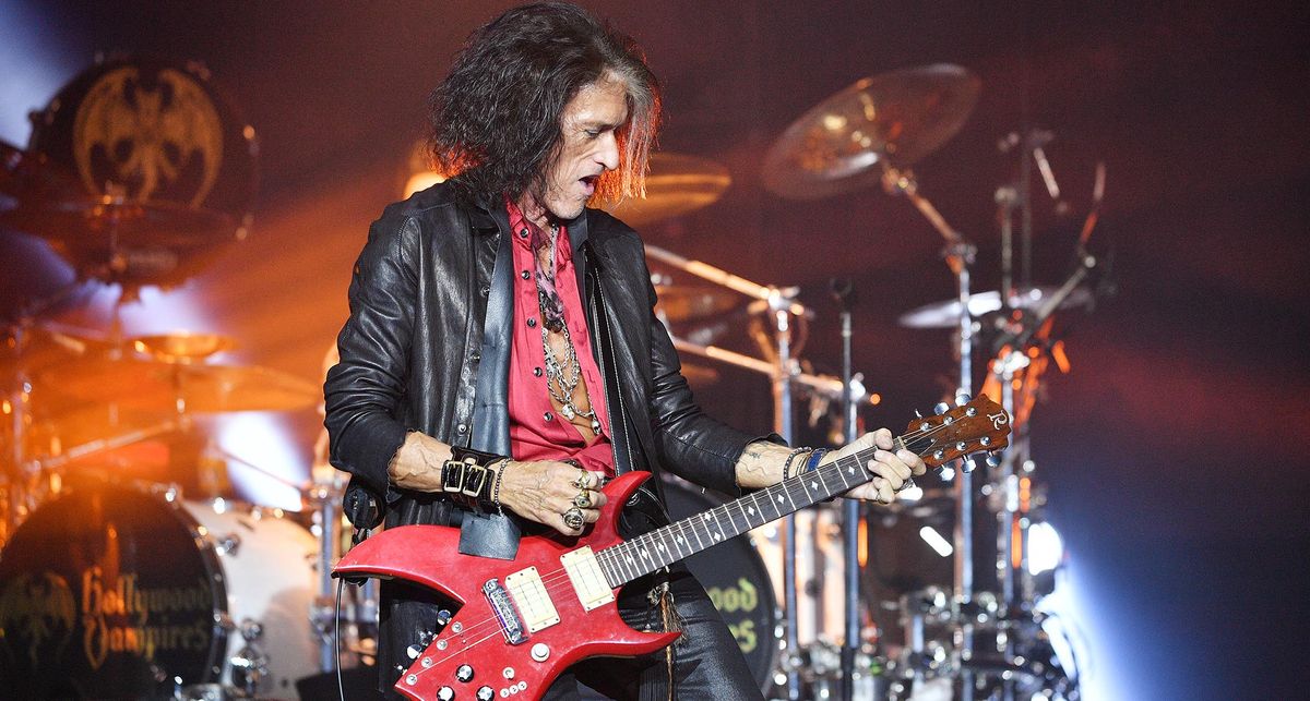 Joe Perry plays a red B.C. Rich Bich live onstage