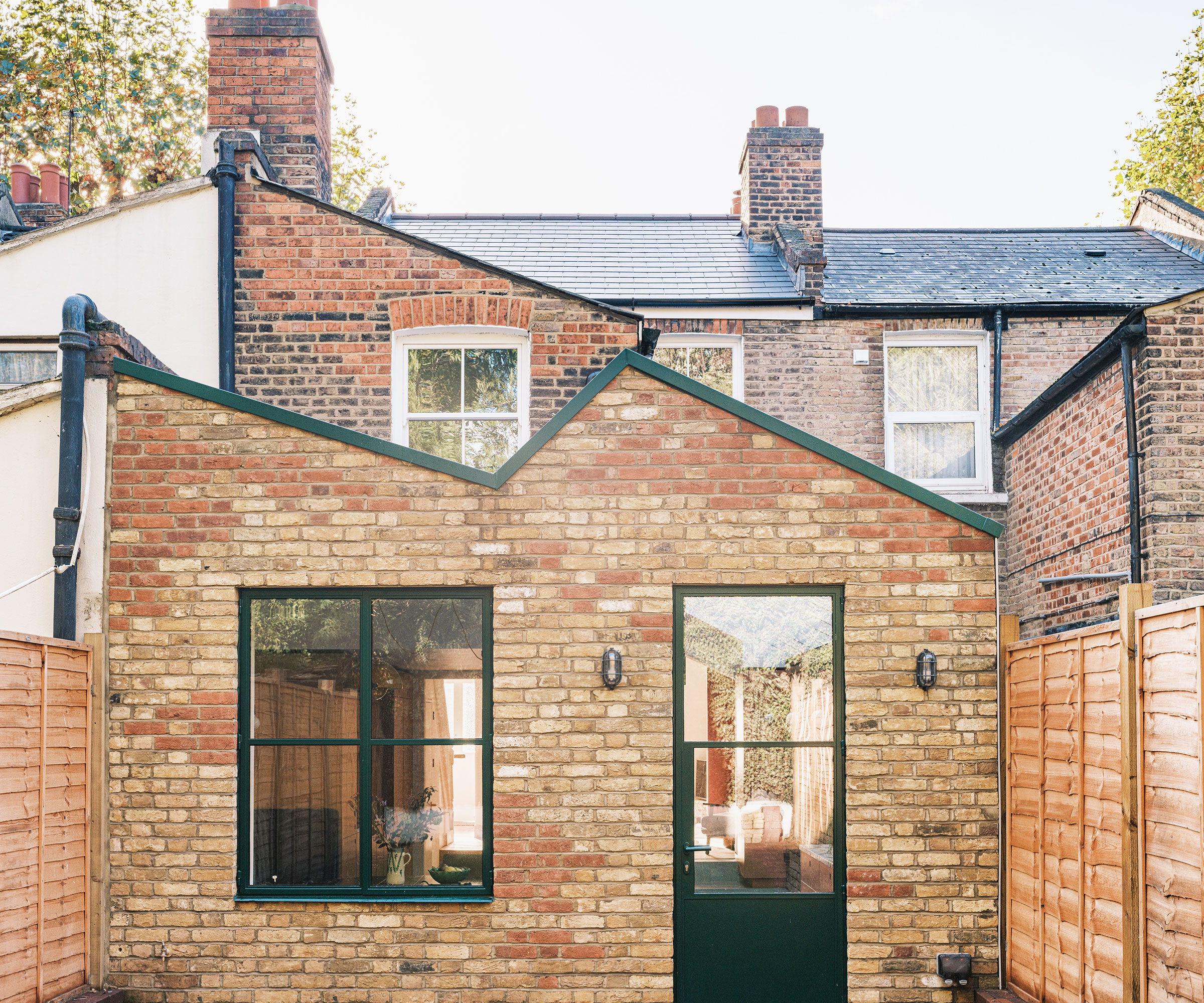 twin pitched roof single storey terraced house extension