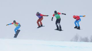 ZHANGJIAKOU, CHINA - FEBRUARY 12: (L-R) Lorenzo Sommariva of Team Italy, Eliot Grondin of Team Canada, Nick Baumgartner of Team United States and Omar Visintin of Team Italy compete during the Snowboard Mixed Team Cross Big Final on Day 8 of the Beijing 2022 Winter Olympics at Genting Snow Park on February 12, 2022 in Zhangjiakou, China. (Photo by Maddie Meyer/Getty Images)