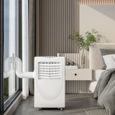 Portable air conditioner in a bedroom.
