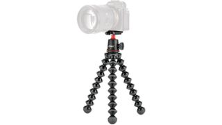 A Joby GorillaPod 3K kit with a Sony mirrorless camera mounted to it on a white background