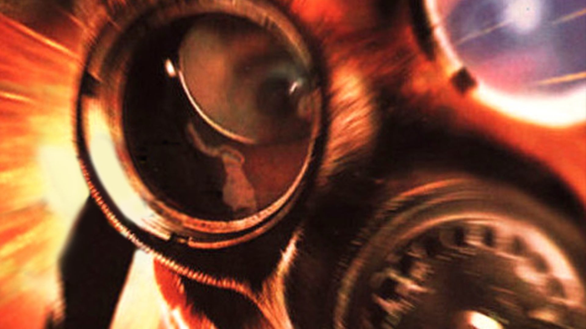 Close-up of an alarmed man in a gas mask.