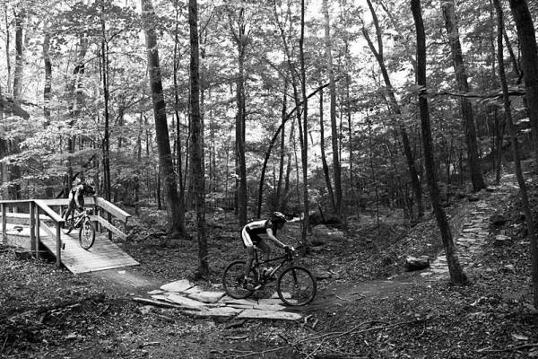 Garth Prosser and Rebbecca Rusch deep in the woods.