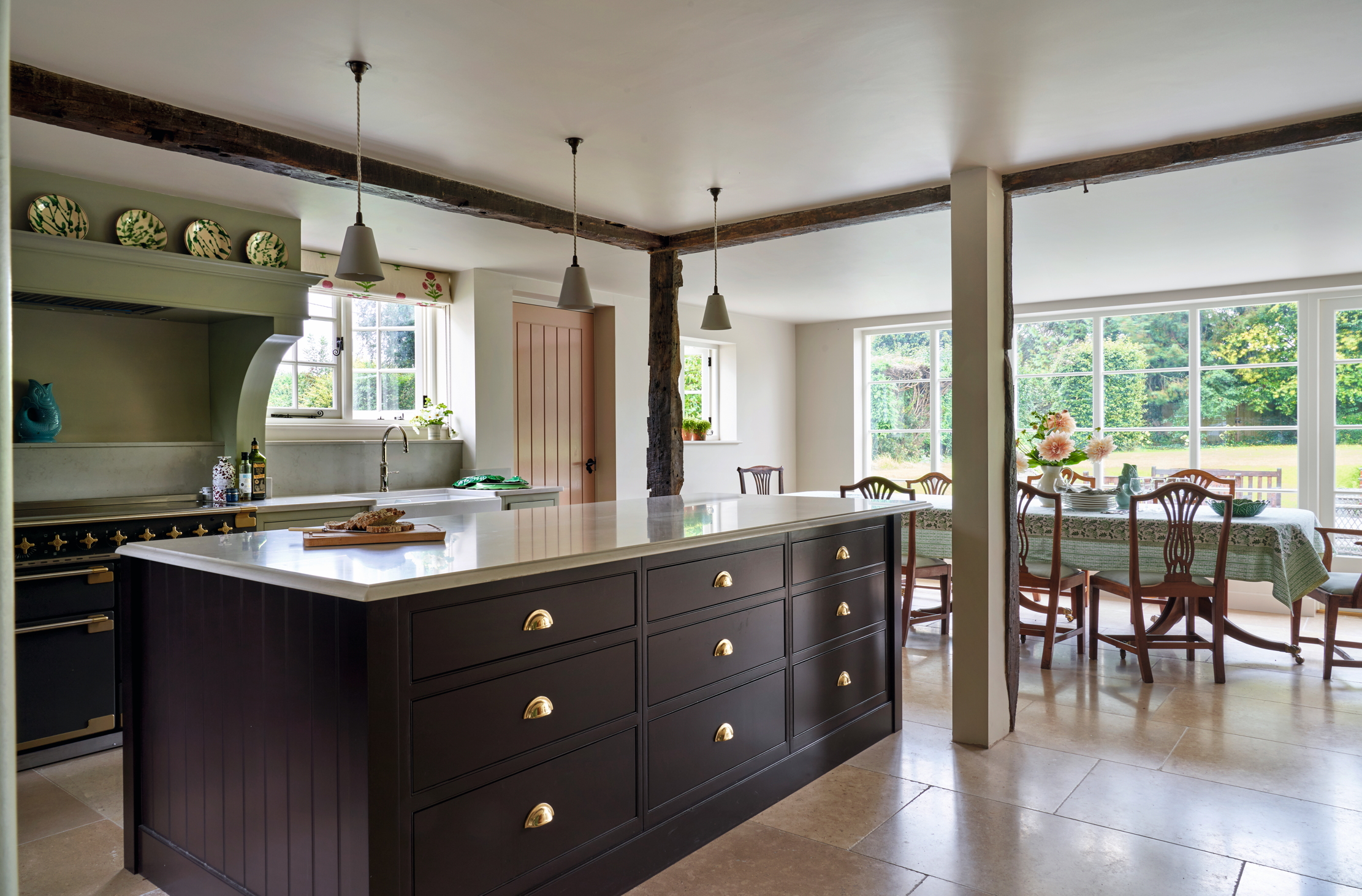 Lapicida limestone and Caesarstone worktops in the kitchen.